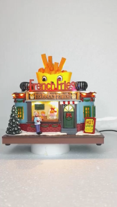 ONELINE #FC819  A whimsical resin French Fries Stand House featuring a cheerful smiling french fry box character on the roof Decoration Village for Tabletop Holiday