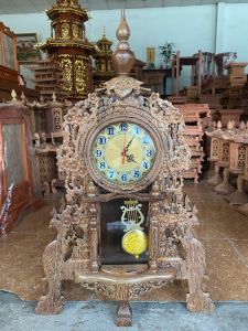 Đồng hồ để bàn gỗ mun đuôi công sang trọng