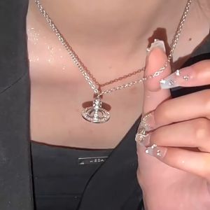 Sterling Flashing Saturn Necklace: Gradual Sparkle for Luxurious Minimalism