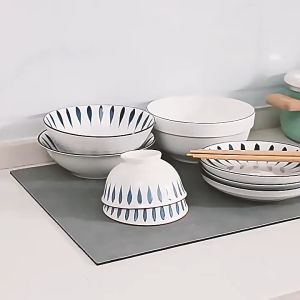 Fresh and Vibrant Tableware Insulation Pad - Silica Diatomite Absorbent and Drainage Mat with Happy Design and Black Dots for Kitchen Use
