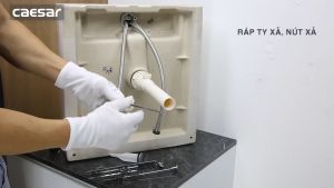Bộ xi phông chậu rửa tay xả nhấn nhựa chính hãng Caesar BF606