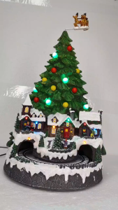 FC606 Christmas Tree Village Train with Colorful lights and miniature houses on a snowy base.
