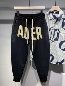 กางเกงวอร์มผู้ชายผ้าฝ้ายแท้ ทรงหลวม สำหรับฤดูใบไม้ร่วง/ฤดูหนาว กางเกงขายาวทรงหลวมพิมพ์ลายตัวอักษร Adhered ทรงหลวม กางเกงขายาวสเก็ตบอร์ด