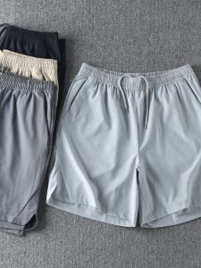 Outdoor Mens Summer Sport Casual Laser Perforated Straight Leg Five-Quarter Pants Pure Color Shorts Fashion Urban Youth