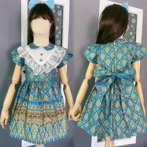 เดรสไทยเด็ก ผ้าคอตตอลพิมพ์ทอง แขนบัว คอบัว อกแต่งระบายลูกไม้+พลอย แถมกิ๊บโบว์ เด็กๆใส่ไปโรงเรียน ไปวัด ออกงาน น่ารักมากๆค่ะ