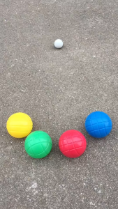 Colorful plastic croquet balls in red yellow and blue with a black carrying case 6+1pcs Bocce Ball Set