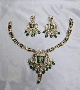 Antique-finished Goddess Green Necklace Set with Intricate Design and Green Stones