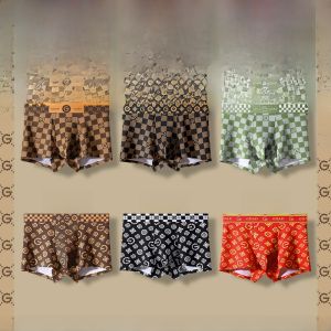 หรูหรา ผ้าฝ้าย ผู้ชายชนิดบรรจุกล่อง กางเกงบ็อกเซอร์ ระบายอากาศได้ดี ไอเดียของขวัญอ่อนเยาว์ไร้รอยต่อคุณภาพระดับพรีเมียมเอวกลาง กางเกงใน