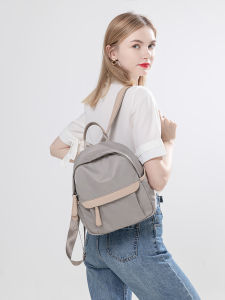 กระเป๋าเป้สะพายหลังผู้หญิงน่ารักกระเป๋าเดินทางกลางแจ้งขนาดเล็ก 2025 ออกแบบใหม่กระเป๋าผ้าใบกันน้ำกระเป๋านักเรียนหญิงมินิกระเป๋า