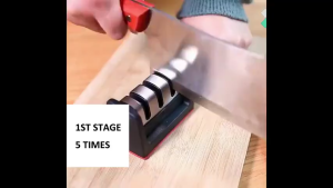 Compact Wall Mountable Knife Sharpener for Small Kitchen Space Saving Solution. Black and red design. Three slots for sharpening. Wall mountable. Fits small kitchen spaces.