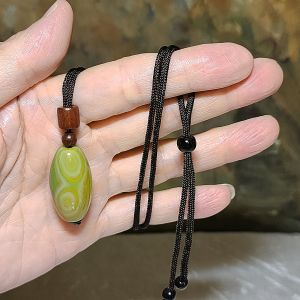 30.8mm Tibetan Sardonyx light yellow green Natural Eyes 3 Eyes "Number 8" Dzi pendant [Natural Crystal] 藏传淡黃绿天然缠丝玛瑙天眼三眼"8字"天珠