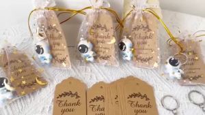 10 Sets of Astronaut Space Keychain with Thank You Label and Star Moon Organza Bag for Birthday Party Shower Gifts
