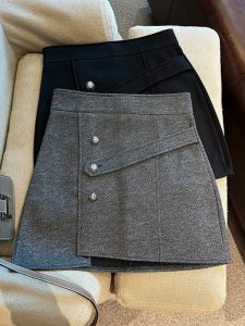 GUZILIAN | Váy ngắn len cạp cao thời trang mùa thu đông mới cho nữ dáng chữ A không đều thon gọn váy ngắn chất liệu khác 100%