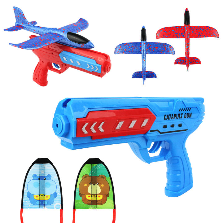 Foam ejection aircraft gun, children hand throwing glider, outdoor ...