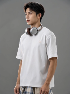 Baleno Mens Top Men 220g Pure Cotton Short T 9826201M1321 Cloud-Soft Cotton Comfort T-shirt. Blue cotton t-shirt with small logo worn with headphones and plaid shirt tied around waist.