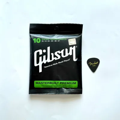 สายกีต้าร์โปร่ง gibson ครบชุด 6 เส้น เบอร์10/47 สายกีต้าร์คุณภาพดี มาตรฐานโลก สายกีต้าร์ที่นักดนตรีเลือกใช้และขายดีที่สุด แถมฟรีปิ๊กกีตาร์ 1 ชิ้นสินค้าคุณภาพดีพร้อมส่งจากไทย