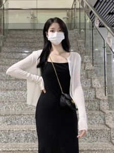 เสื้อคาร์ดิแกนไหมน้ำแข็งบางๆ สำหรับผู้หญิง แขนยาว ปกโปโล ปกป้องแสงแดด สีขาว เสื้อคลุมผู้หญิง ฤดูร้อน 2024 เสื้อคลุมยาวคลุมไหล่