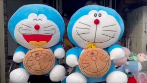 Thú nhồi bông Doraemon ôm bánh rán - Size từ 40cm đến 80cm - Quà tặng gấu bông Doraemon dễ thương.