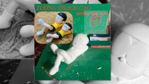 Tượng tô màu Nobita Nô Bi Ta nằm chơi tượng thạch cao trắng tô tượng
