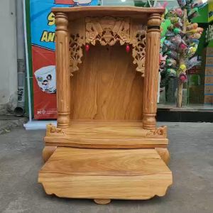 Bàn thờ thần tài ông địa gỗ gõ đỏ cột tròn ngang 60cm mẫu mới rất đẹp