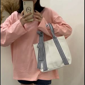 SDOGB3631 กระเป๋าสะพายไหล่ ผ้าแคนวาส ใบเล็ก ใส่ A4 ได้  สไตล์ญี่ปุ่นสําหรับนักเรียนหญิง สีดำ/ขาว