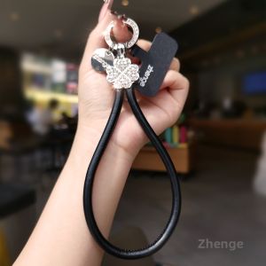 ZHENGEGE | Stylish and Convenient Diamond Clover Phone Strap