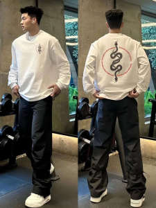 Áo Thun Nam Tay Dài Cotton Nguyên Chất Mùa Xuân Thu Phong Cách Mới Rộng Rãi Thời Trang Cổ Tròn Đa Năng Thường Ngày Phiên Bản Hàn Quốc