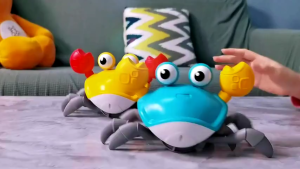 Crawling crab baby toy with light up and music usb rechargeable or windup baby toddler interactive
