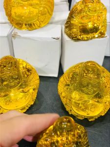 mini laughing buddha 勒佛是解脱烦恼的化身“开口便笑，笑天下可笑之人，大肚能容，容天下难容之事。”是保佑避灾，吉祥如意的象征，也代表了人们向往宽容、和善、幸福的愿望。  ✨金黄透亮黄琉璃 吉祥福气🧧弥勒笑佛  两种款式选择⬇️  A款尺寸-高: 4.5cm  宽: 4.5cm x 3cm  重: 65g B款尺寸-高: 5cm  宽: 5.5cm x 5cm  重: 158g  价格:  A款RM13.9/pc B款RM15.9/pc