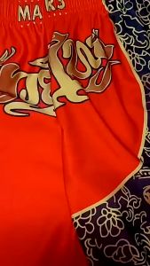 อกแบบปักเ คิกบ็อกซิ่งกางเกงขาสั้นพรีเมี่ยม การฝึกอบรมต่ อสู้กีฬากางเ กงออกกําลังกาย