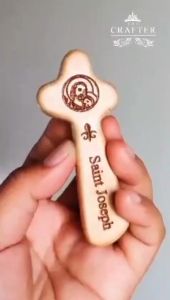 God is with You: Wood Cross Holding & Spiritual Comfort