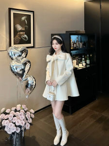 เสื้อคลุมขนสัตว์ผู้หญิงฤดูหนาวยาวปานกลางหรูหรา ดีไซน์ผูกโบว์ ขนสัตว์สองด้าน ขนแกะสีดำและสีขาว เสื้อคลุมผู้หญิง