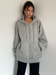 เสื้อสเวตเตอร์มีฮู้ดสีเทาสไตล์ยุโรปและอเมริกาแบบสบายๆทรงหลวมแบบเดียวกันกับ Jinji Ni เสื้อตัวนอกมีซิปหนาพิเศษใส่ช่วงฤดูใบไม้ร่วงและฤดูหนาวสำหรับผู้หญิง