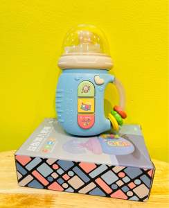 Bình Sữa Gặm Nướu Kèm Xúc Xắc Có Âm Thanh Tiếng Ồn Trắng Chất Liệu Nhựa ABS an toàn cho bé phù hợp cho bé từ 3 tháng tuổi