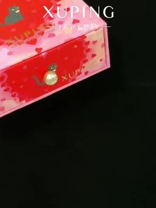 XUPING | Elegant Four-pronged Round Ring