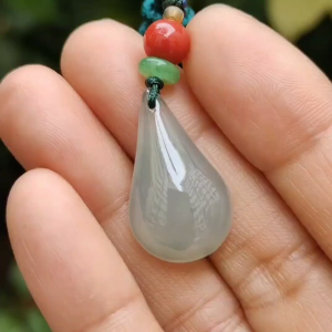 Drop Shape Crafting on Natural Type A Jadeite Jade as Pendant in Singapore with certificate weighs 5.93 grams measurement 24.5 * 14.6 * 6.1 mm (pendant 334)