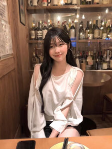XIANGBAIWEI | Off-Shoulder Lace-Up Long Sleeve Blouse