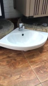 CHẬU RỬA MẶT LAVABO GÓC NHỎ MK602 (37x37 cm) đẹp sang trọng tinh tế cho không gian nhỏ bền bỉ với thời gian