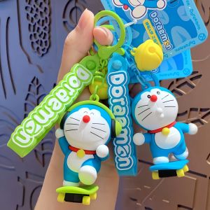 2024 New Dora a Dream Car Keychain Womens Elegant Backpack Pendant Couples Doll Keychain Cartoon Themed Automobile Accessories