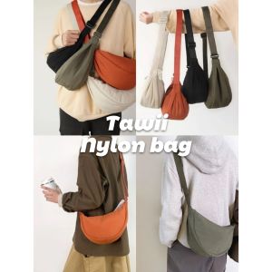 Tawii. Nylon bag Sports casual bag Cross body slingbag Thick water proof designed in Japan fashion dumpring bag travel bag