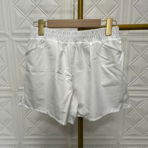 Quần đùi nữ tập gym yoga aerobic thể thao 2 lớp xẻ gấu chất xi dù có 2 túi thoáng mát BINSPORTS Q202