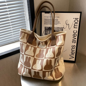 กระเป๋าผ้าใบทรงโตสำหรับใส่ของใช้ประจำวันสำหรับผู้หญิง ความจุขนาดใหญ่ กระเป๋าสะพายไหล่ข้างเดียวสำหรับเด็กนักเรียน กระเป๋าถือสำหรับเดินทาง