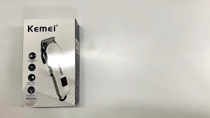 Kemei เครื่องตัดผมไฟฟ้าแบบชาร์จไฟได้ สำหรับผู้ชาย ปัตตาเลี่ยนมืออาชีพ พร้อมจอLCD แบตเตอรี่ทนนาน ช่างตัดผมรุ่น KM-809A