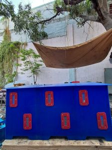 Triple Derby Cage storage box handles outdoor setting blue with red accents