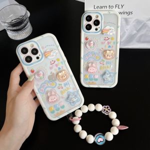 CrashStar 3D Doll Cute Cartoon Hard Transparent Phone Case With Bracelet Lanyard For iPhone 16 15 14 13 12 11 Pro Max Plus 16e X XR XS Max Shockproof Phone Casing Cover With Full Cover Lens Camera Protection Hot Sale