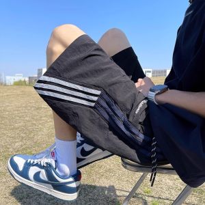 Quần Short Thể Thao Nam Mùa Hè Mỏng Nhanh Khô Ba Sọc Phong Cách Mỹ Cỡ Lớn Quần Bóng Rổ Rộng Rãi Thoáng Khí