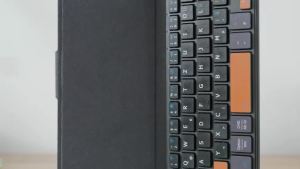 JOMAA | JOMAA Bluetooth Mini Keyboard Wireless Compact Keyboard with Orange Navigation Keys & Any-Angle Stand for Android/iOS/Windows