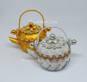 โปรยทานกาน้ำโบราณแพ็ค 10 ชิ้น (ตัวเปล่าใส่เหรียญที่หลัง)