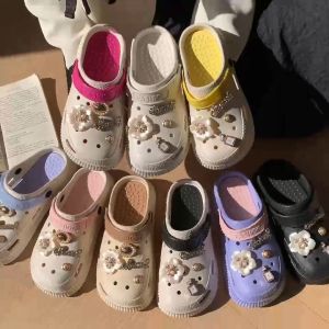 หัวโต รองเท้า สวมรัดส้น พร้อม ตัวติดดอกไม้ เพชร รองเท้าแตะผู้หญิง 👑 SUNBALEE