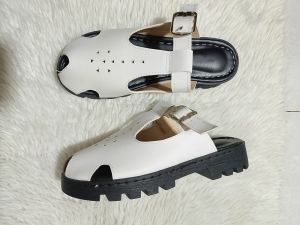 Chucky heels Betty Made in Liliw Laguna sandals with black soles and perforated design in brown black and beige colors.